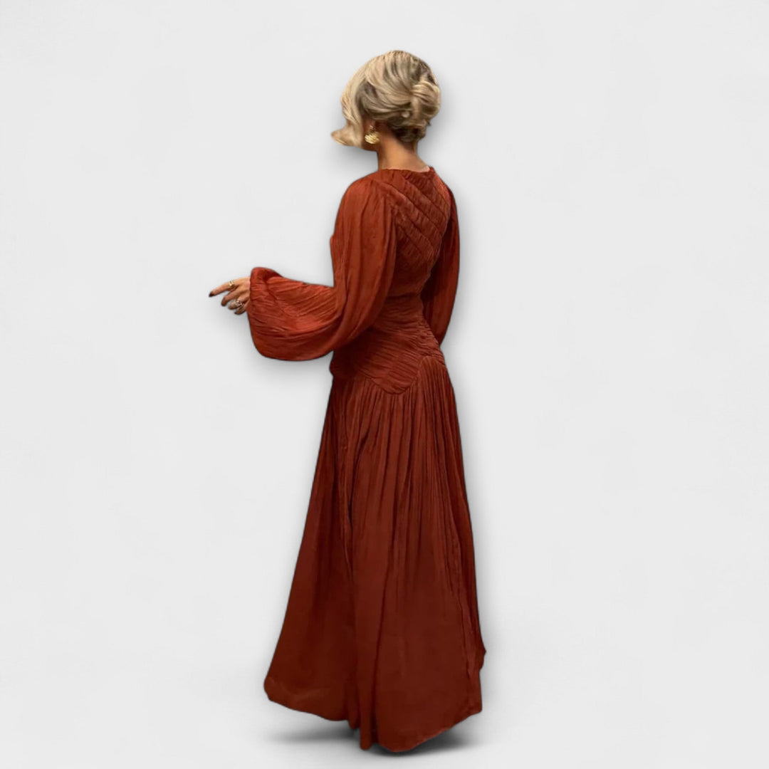 Vestido plisado elegante con mangas largas