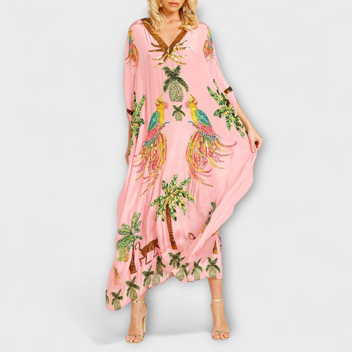Linda - Impresionante vestido con tirantes asimétricos y estampado de palmeras